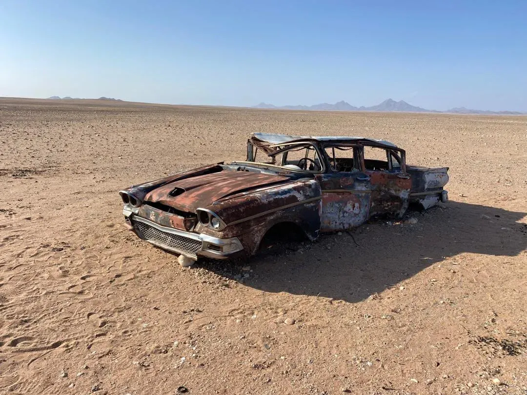 A rusted relic marooned in the sands of Iona National Park