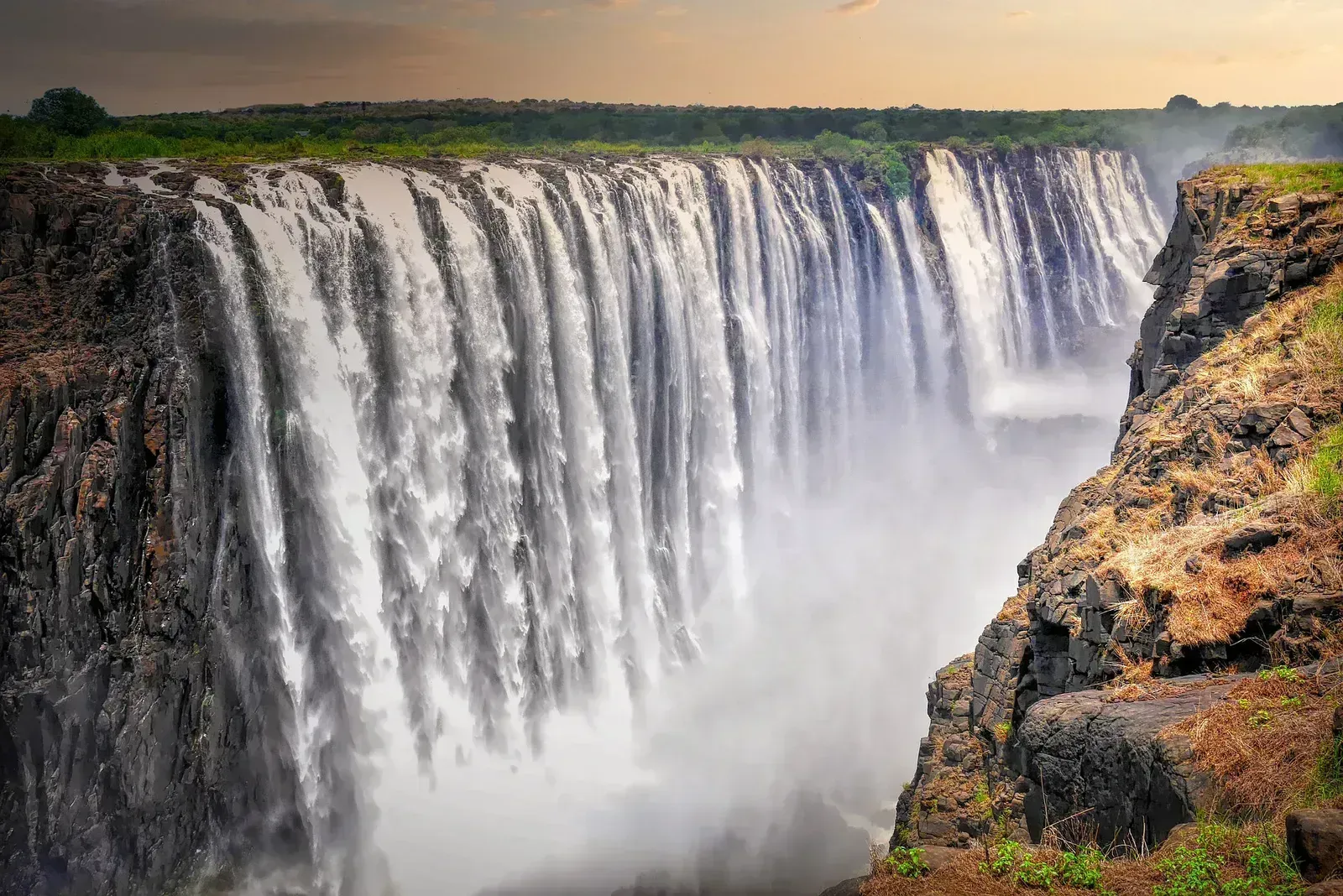 Victoria Falls thunders a short drive to the east