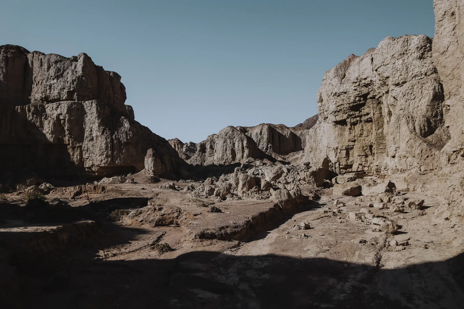 Pale, wind-carved canyon walls in the dry north-west