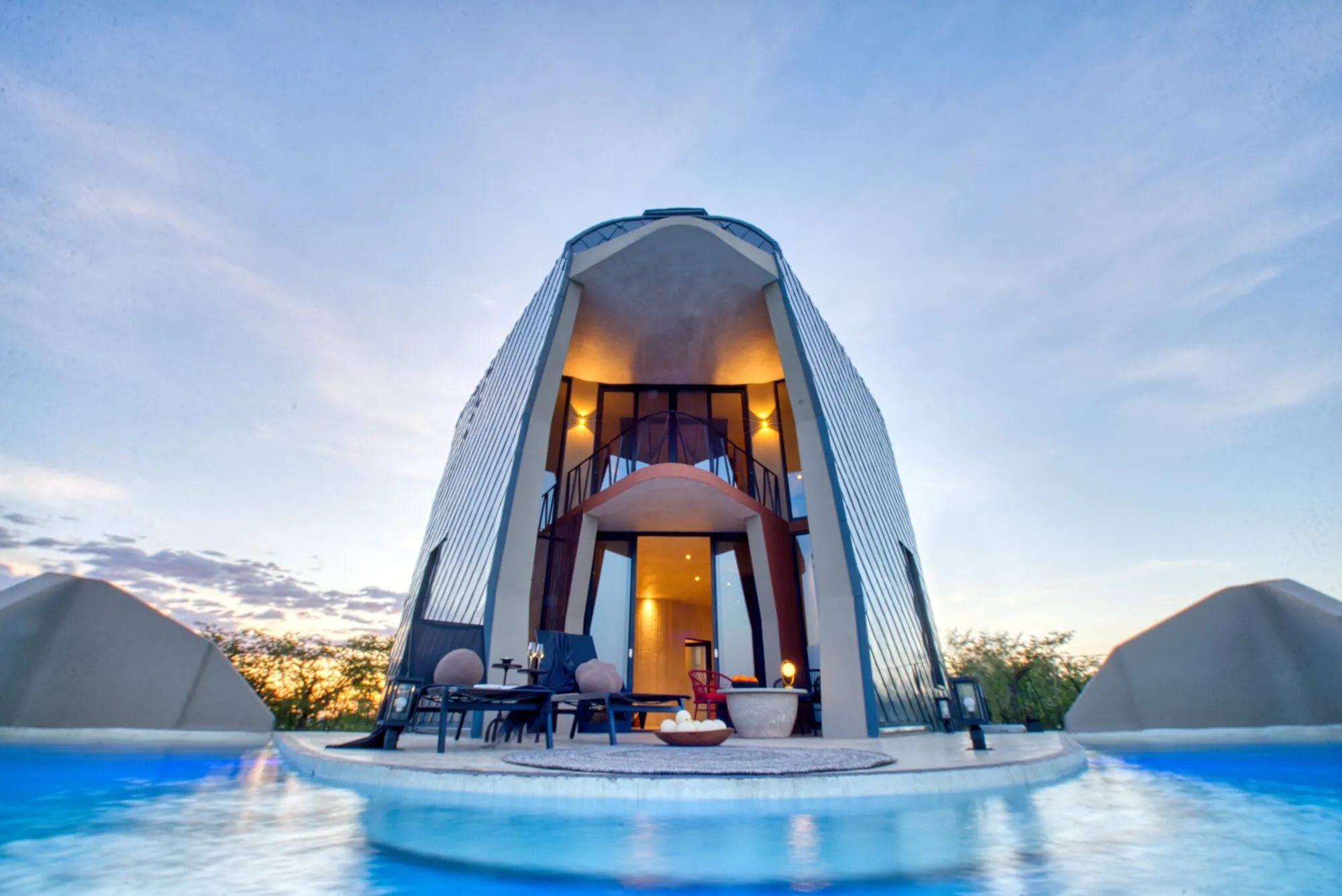 The Ekipa Etosha Pod — a single double-storey pod 10 km south of Andersson Gate, with a bed that rolls onto the balcony.