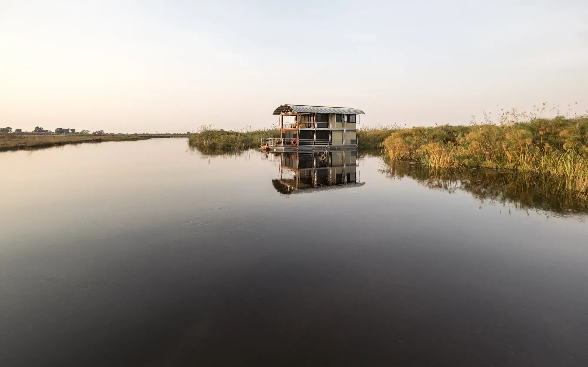 Namushasha River Villa — one villa on the Kwando in the Zambezi Region, reached by boat from the lodge.