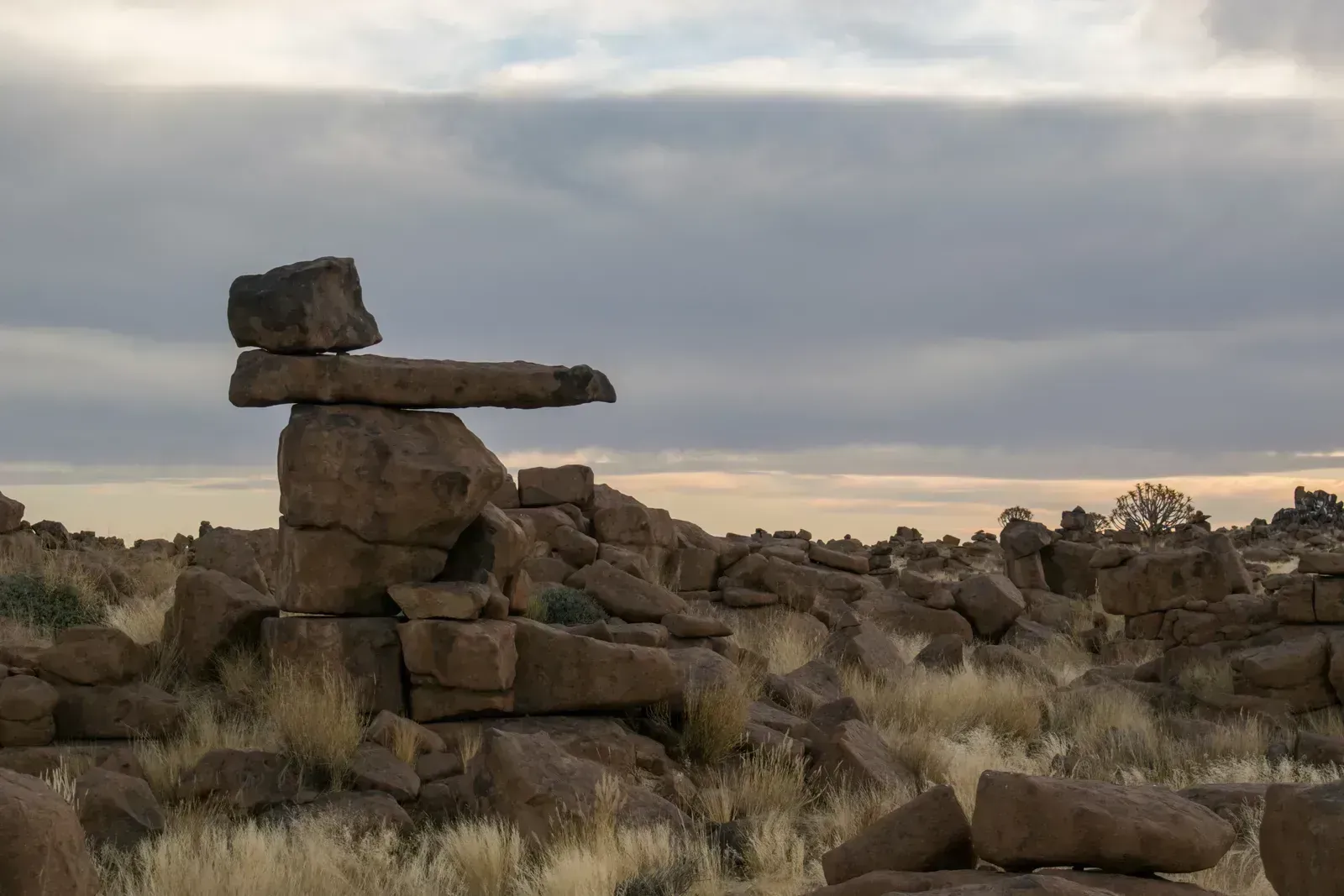 A precariously balanced rock at dusk in the Giant's Playground