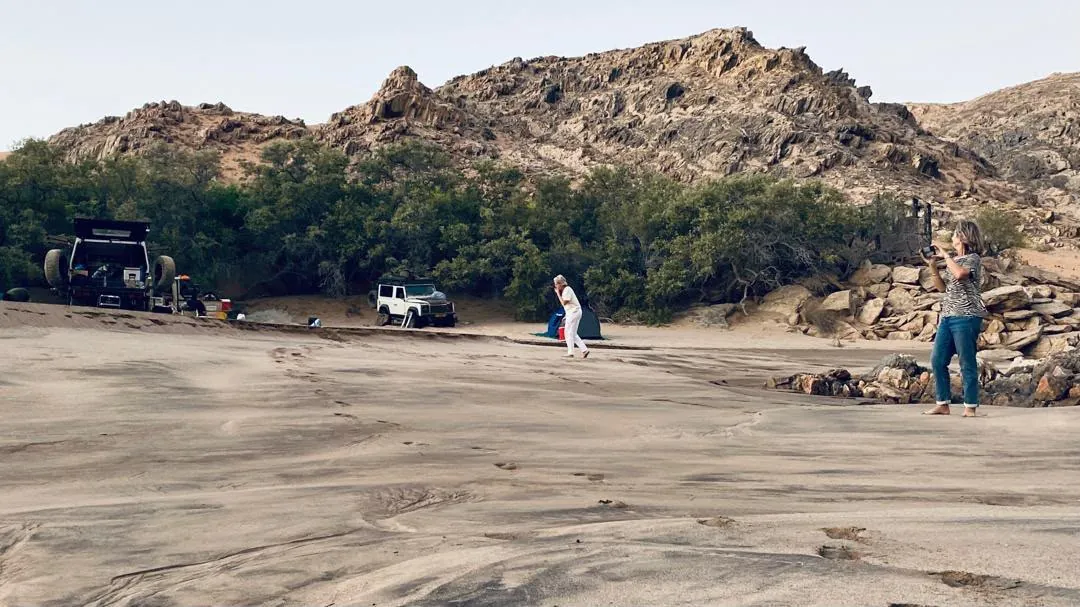 Making camp in a tree-lined riverbed among the koppies